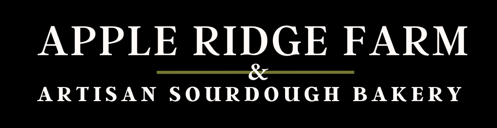 Logo design for a farm-themed business featuring a stylized market cart with a canopy, accompanied by bold, purple text reading "FARMLOGO."